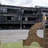 La façade de l'école des Ranches est carbonisée.